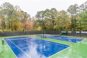 a view of a swimming pool with a patio