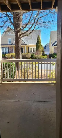 a bathroom with a sink mirror and toilet