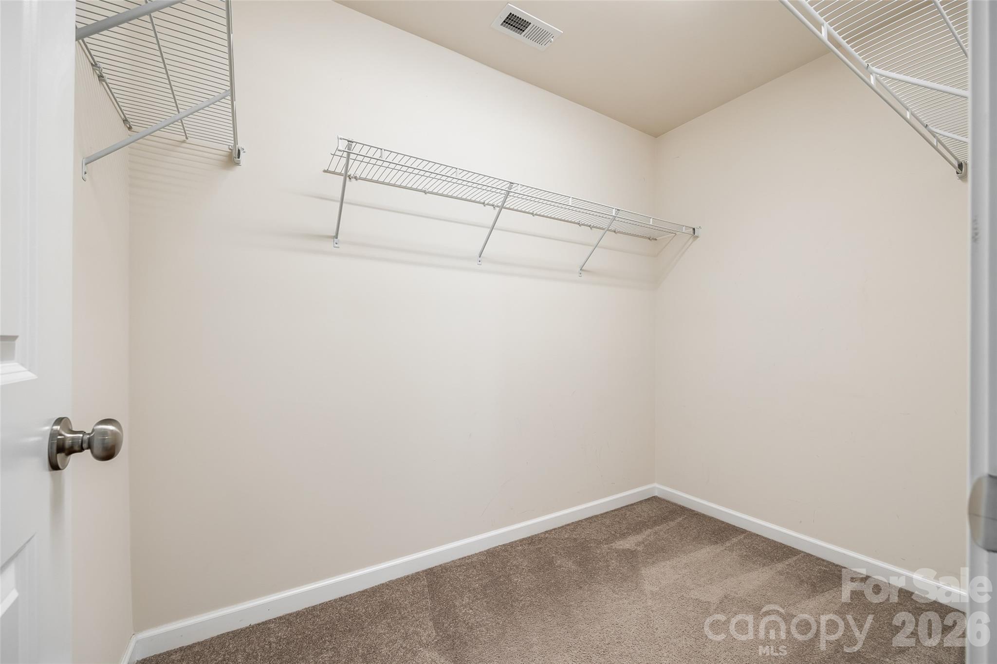 524 Hunters Dance Road Fort Mill, SC 29708 - Photo 12 of 34 a view of a room with racks on the wall