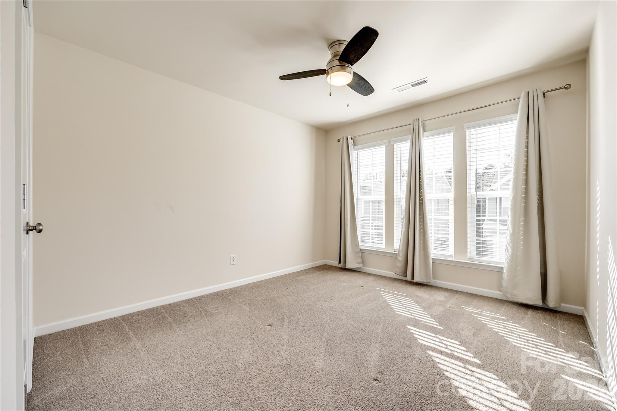 524 Hunters Dance Road Fort Mill, SC 29708 - Photo 14 of 34 a view of an empty room with a window