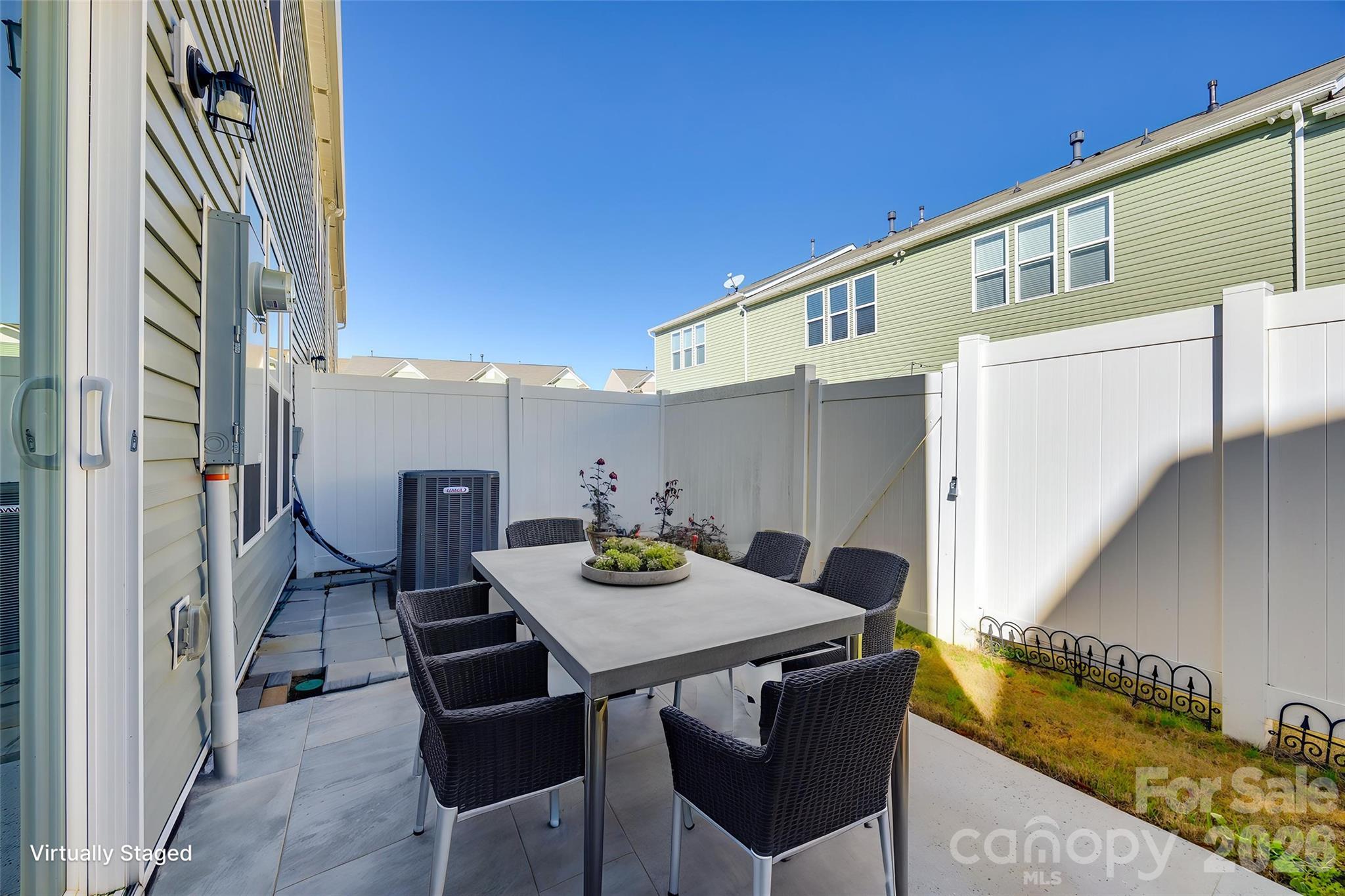 524 Hunters Dance Road Fort Mill, SC 29708 - Photo 17 of 34 a view of a patio with table and chairs