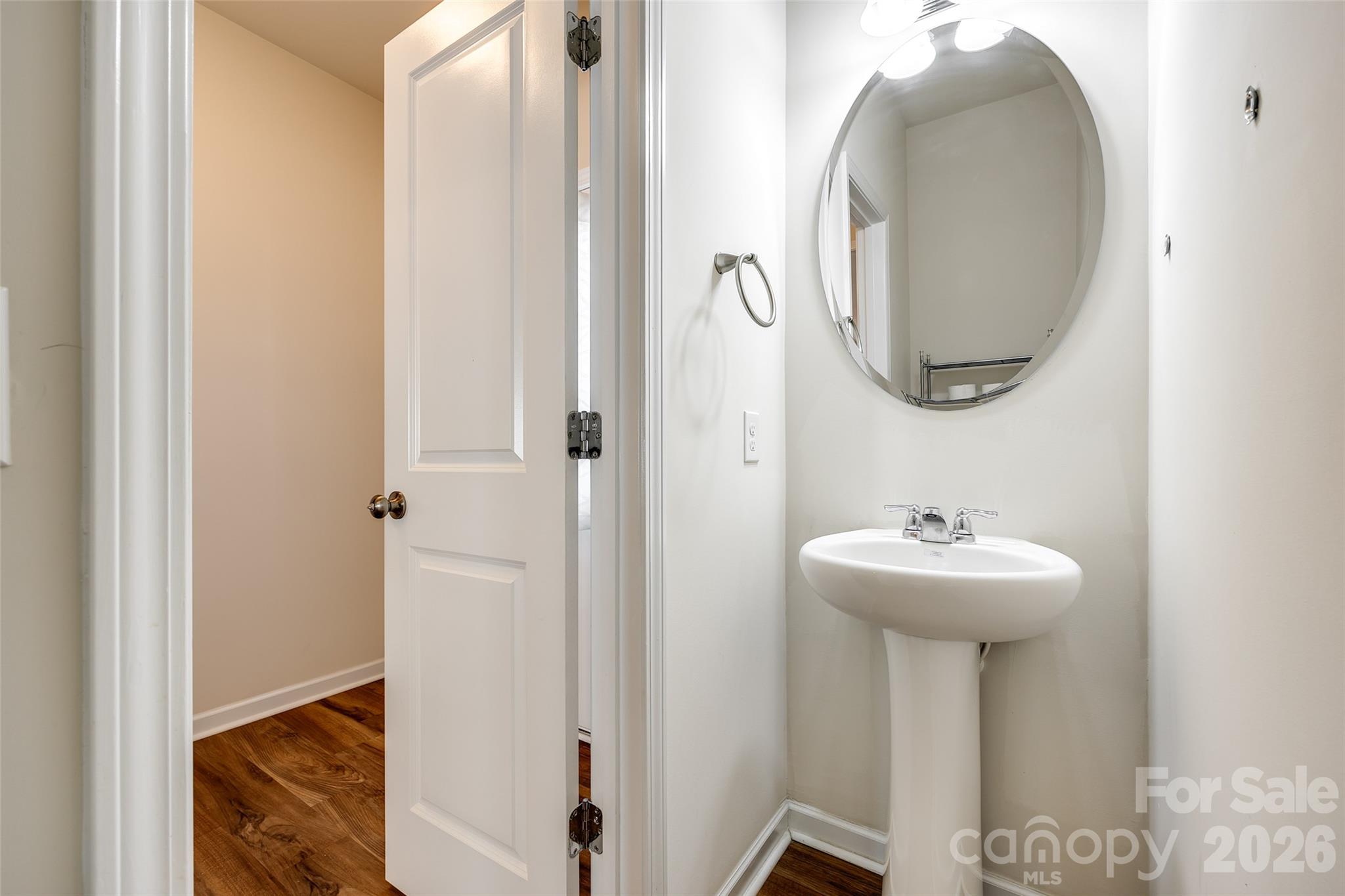 524 Hunters Dance Road Fort Mill, SC 29708 - Photo 29 of 34 a bathroom with a sink and a mirror