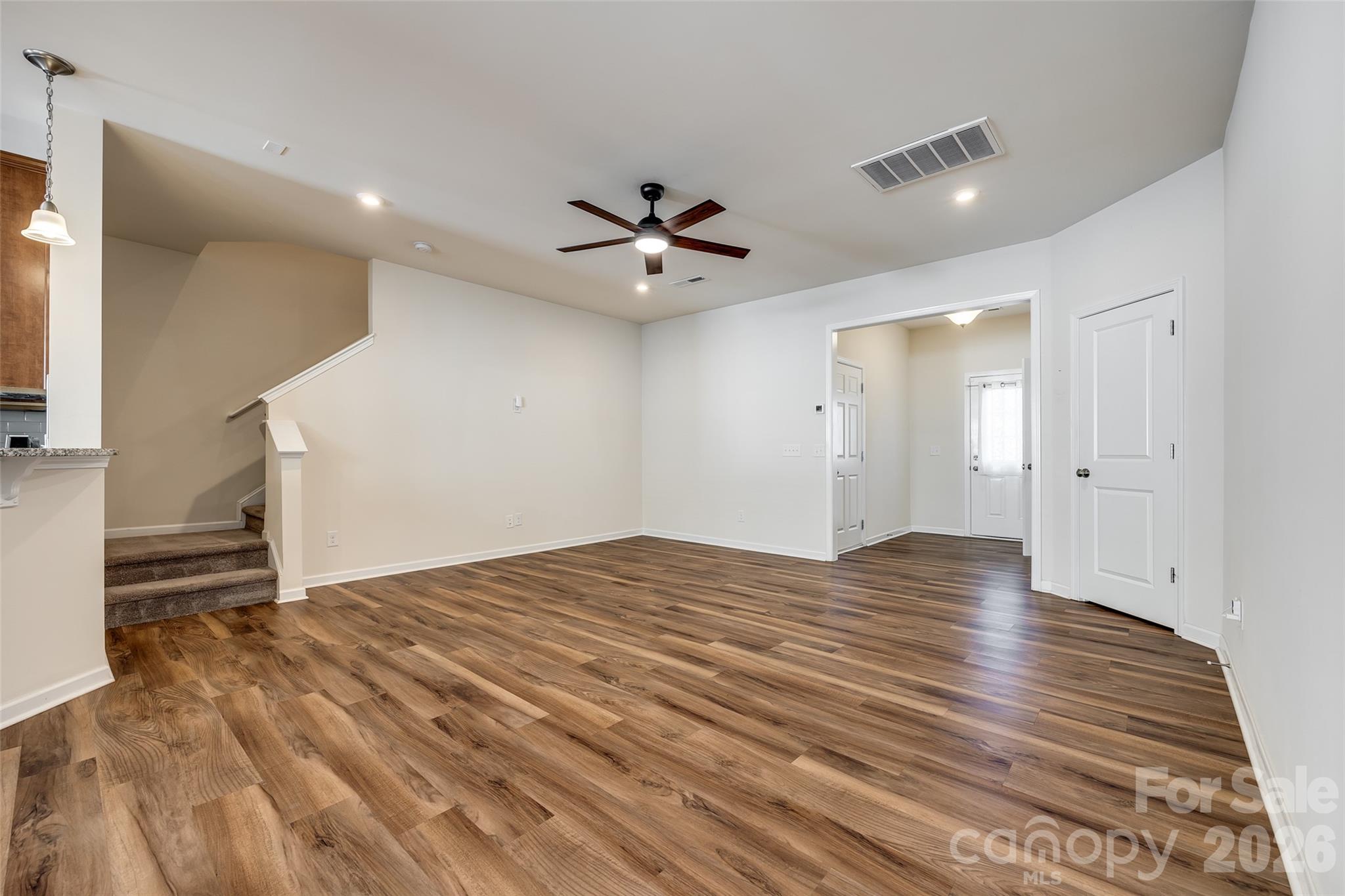 524 Hunters Dance Road Fort Mill, SC 29708 - Photo 3 of 34 wooden floor in an empty room with a window
