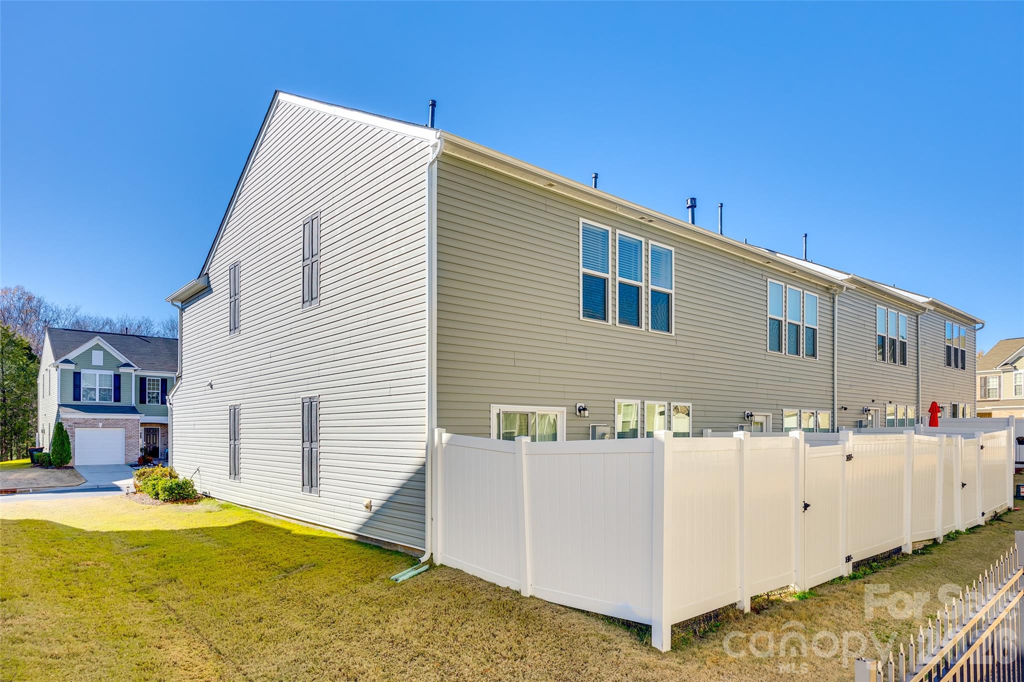 524 Hunters Dance Road Fort Mill, SC 29708 - Photo 32 of 34 a view of a house with a backyard