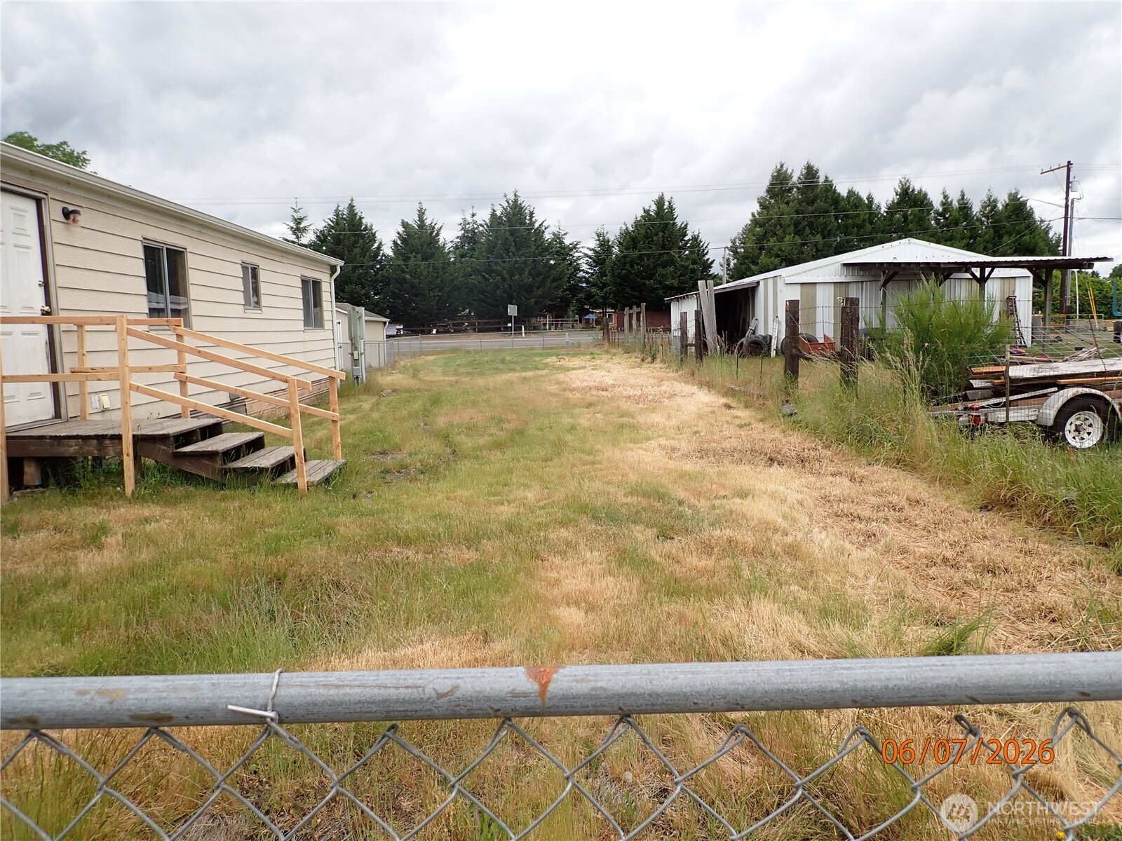 9217 183rd Avenue Southwest Rochester, WA 98579 - Photo 10 of 26 a view of a swimming pool with a yard