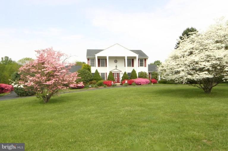 1904 Ednor Road Silver Spring, MD 20905 - Photo 2 of 30 a front view of a house with garden