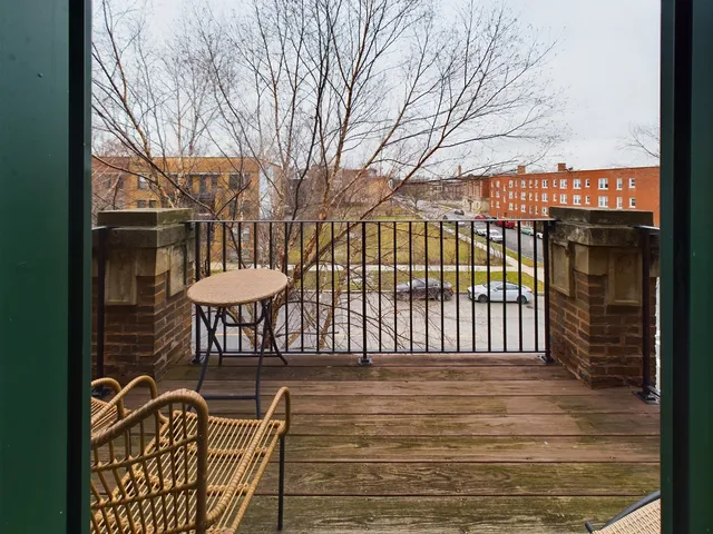 a view of a chairs and a tables in the patio