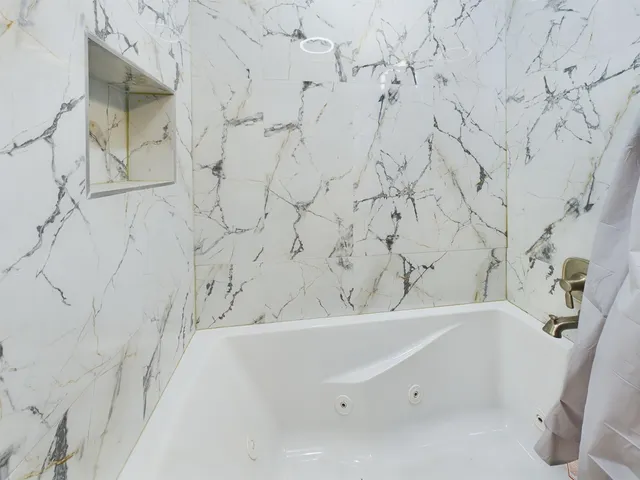 a bathroom with bathtub