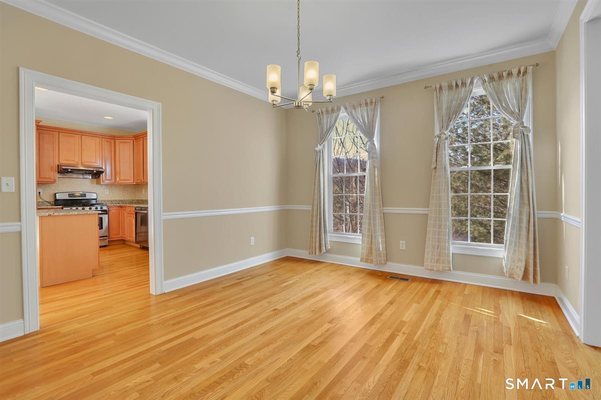 25 Fenwick Drive Avon, CT 06001 - Photo 15 of 40 wooden floor in an empty room with a window