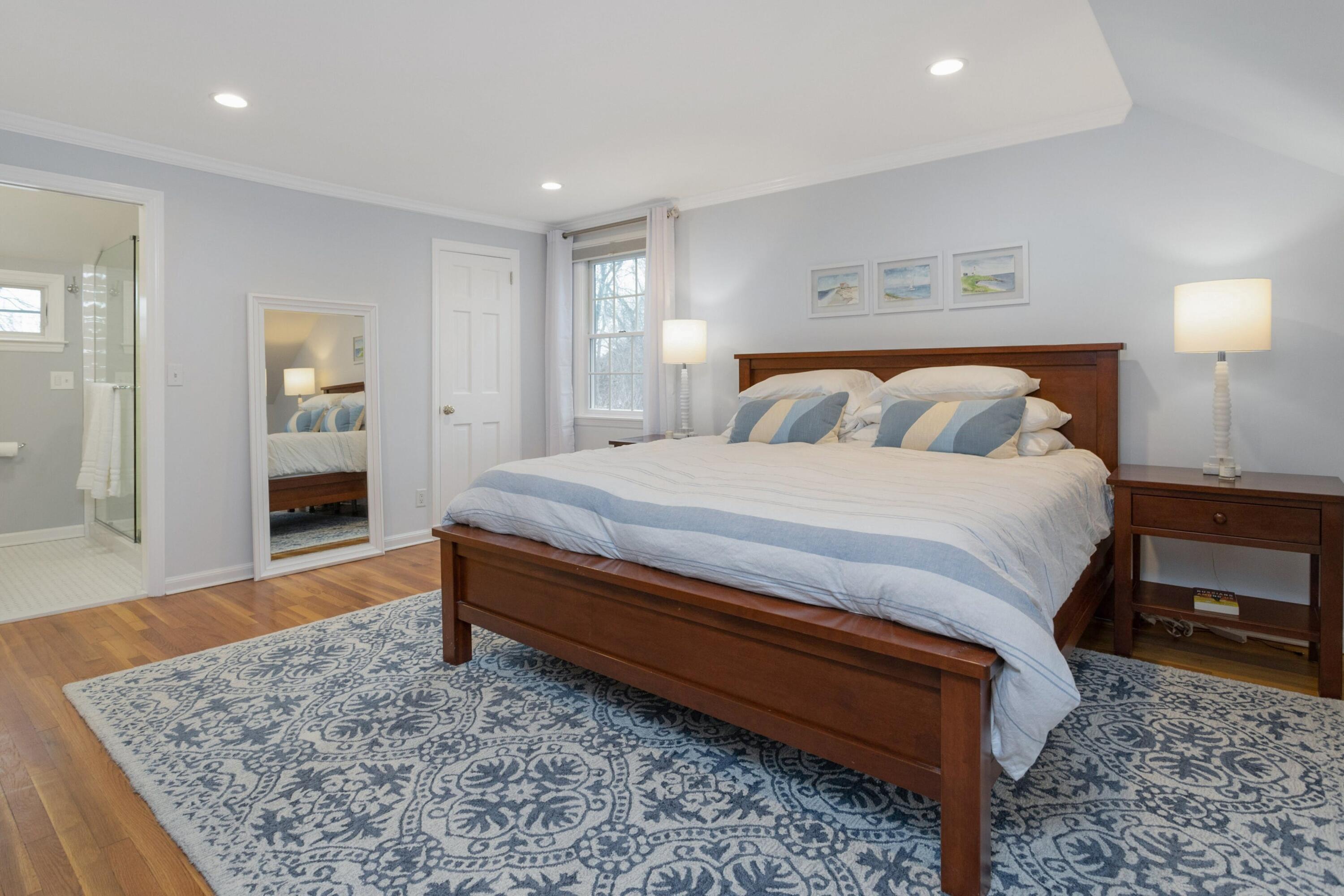 103 Hollow Tree Ridge Road Darien, CT 06820 - Photo 24 of 35 a bedroom with a bed and a dresser