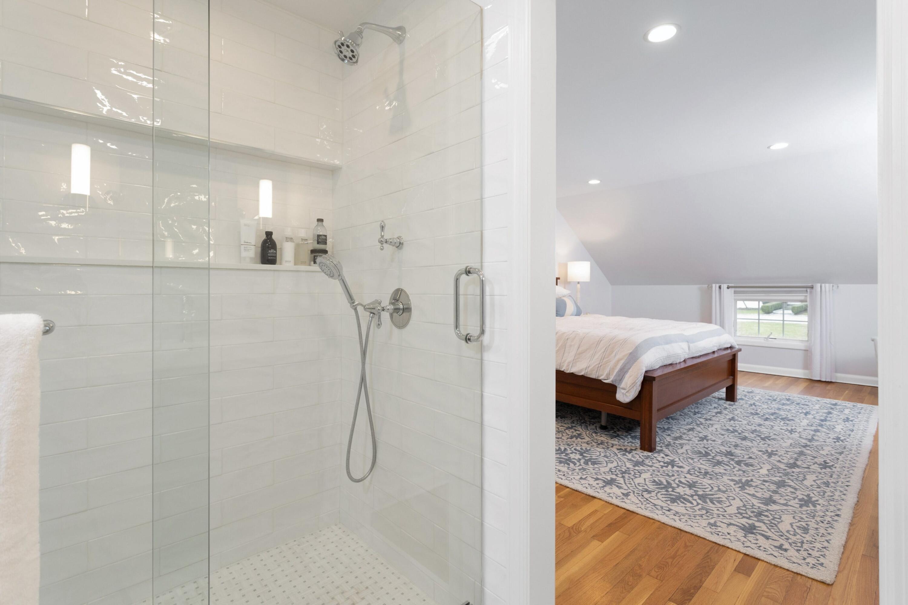 103 Hollow Tree Ridge Road Darien, CT 06820 - Photo 27 of 35 a bathroom with a tub sink and shower