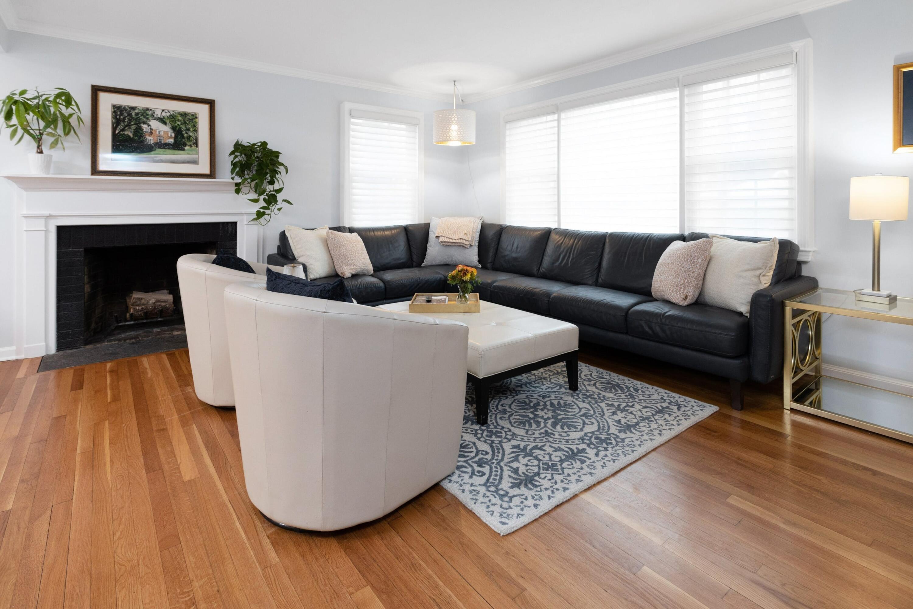 103 Hollow Tree Ridge Road Darien, CT 06820 - Photo 4 of 35 a living room with furniture and a fireplace