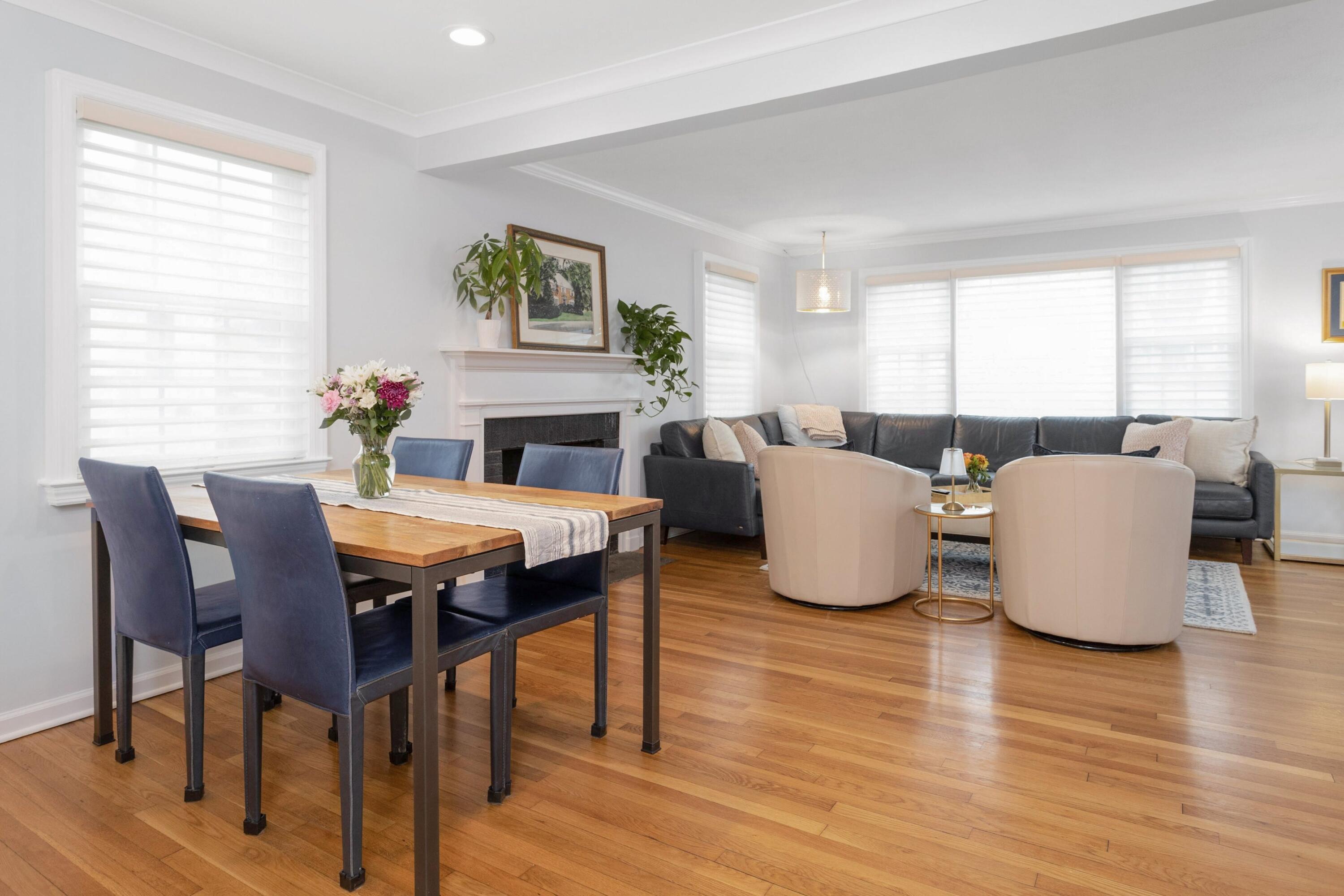 103 Hollow Tree Ridge Road Darien, CT 06820 - Photo 6 of 35 a dining room with furniture a window and wooden floor