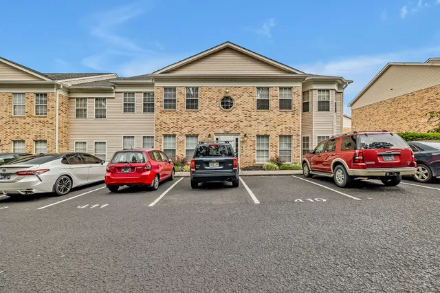 a car parked in front of a house