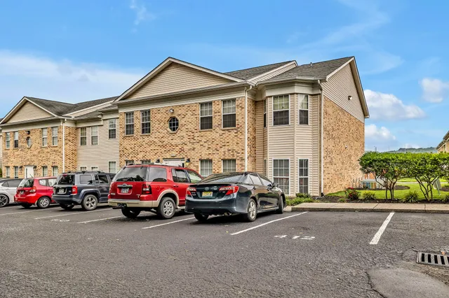 a car parked in front of a house