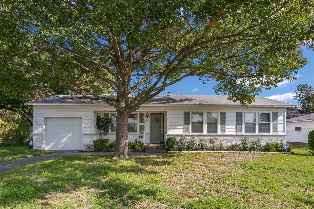 1025 North 63rd Street Waco, TX 76710 - Photo 1 of 1 front view of a house with a yard