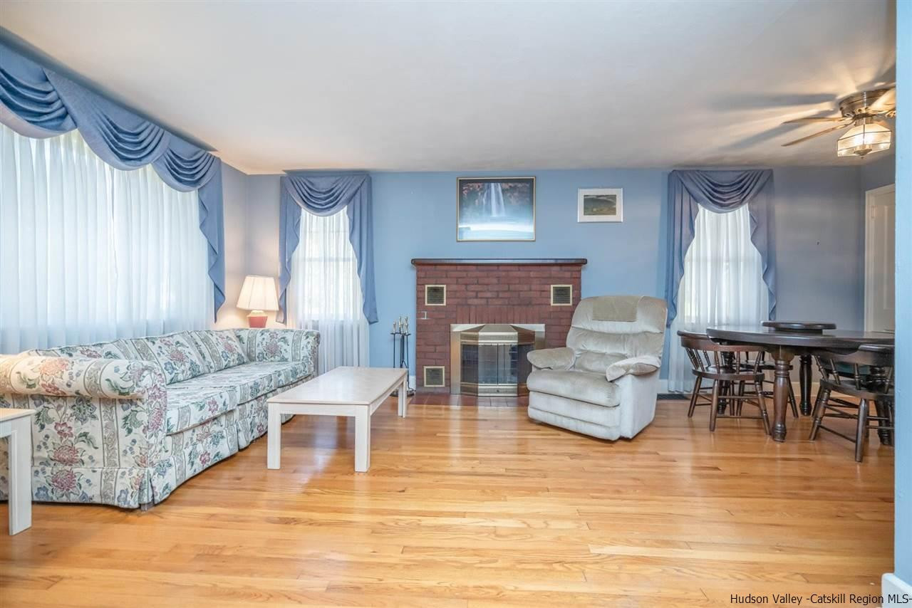 1034 Pine Place Kingston, NY 12401 - Photo 3 of 22 a living room with furniture and a wooden floor