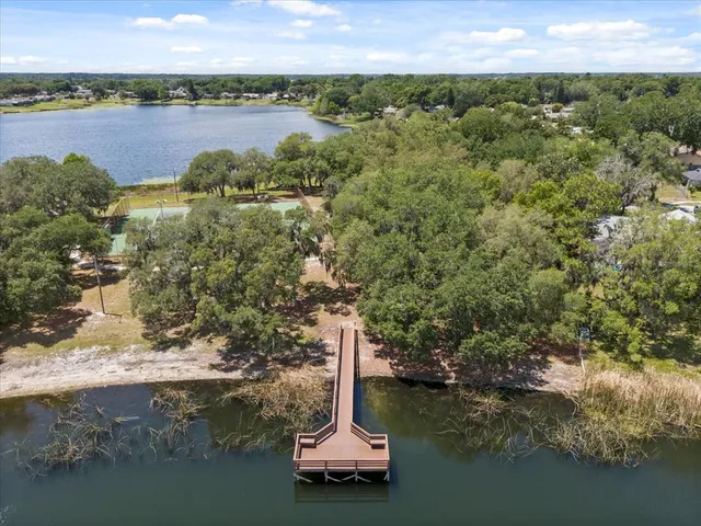 a view of a park with swings and slides