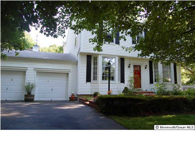 90 Aberdeen Road Matawan, NJ 07747 - Photo 2 of 3 a house view with a garden space