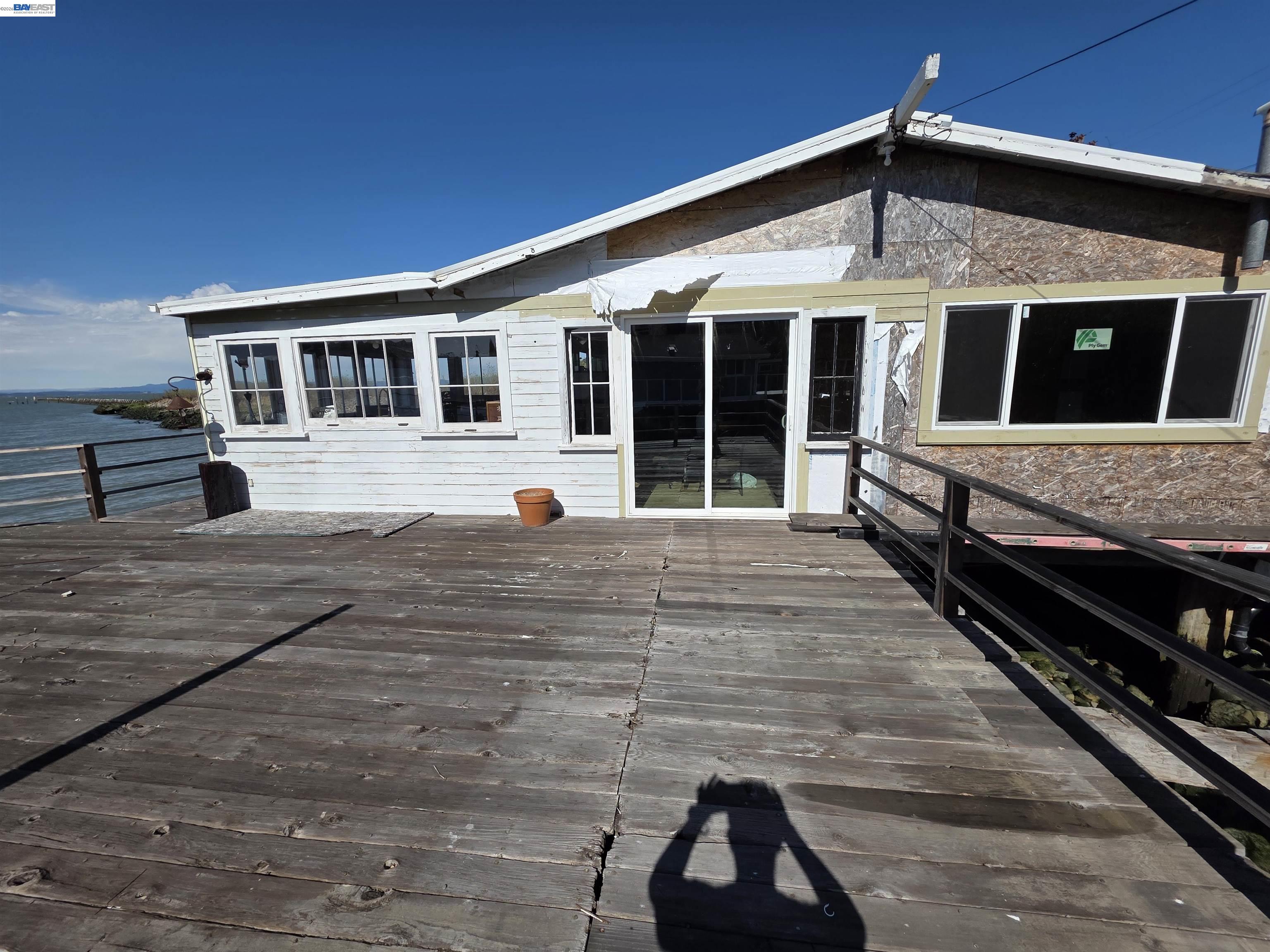 40 Sandy Beach Road Vallejo, CA 94590 - Photo 4 of 10 a view of a house with backyard and sitting area