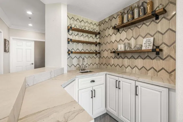 a bathroom with a sink and a bathtub
