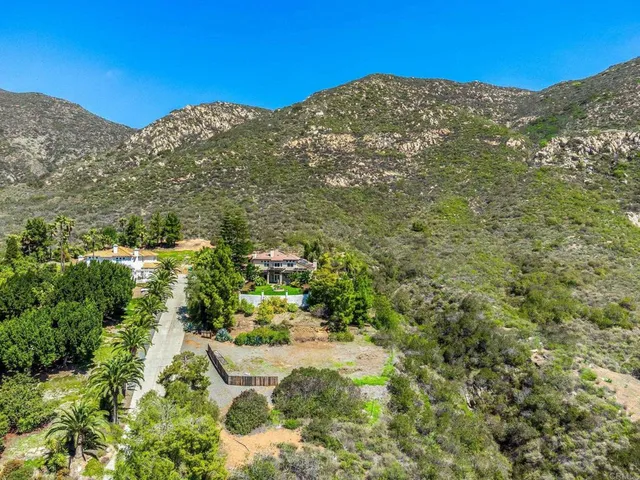 a picture of a book and a white wall