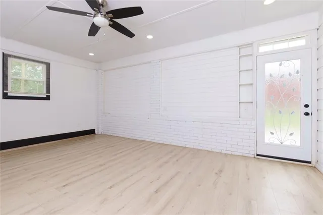 a bathroom with a bathtub and shower