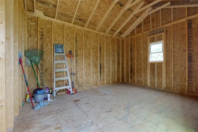 a view of a backyard with a garden
