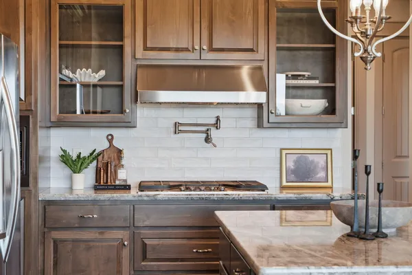 a kitchen with a sink and cabinets