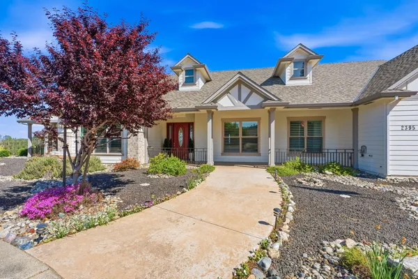 a front view of a house with a porch