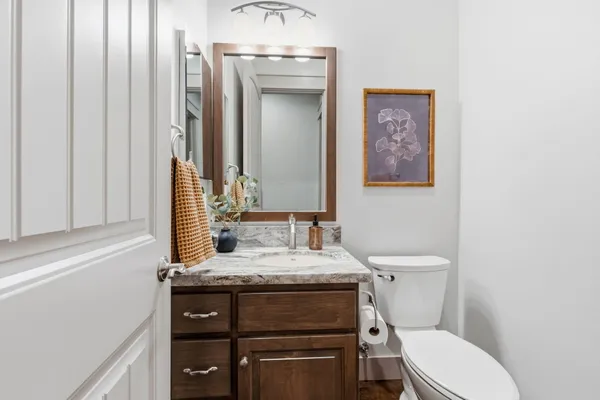 a utility room with cabinets washer and dryer