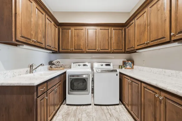 a bathroom with a tub and shower