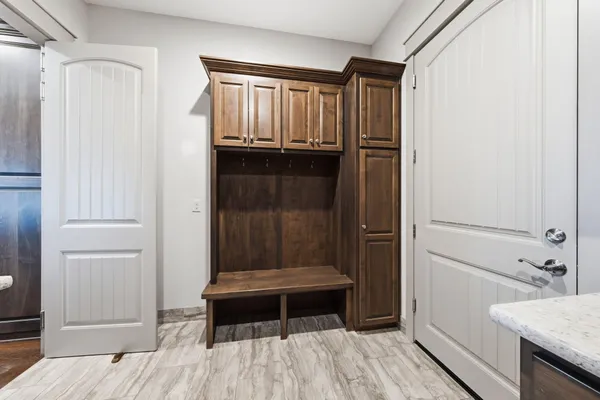 a view of living room with furniture and a large window