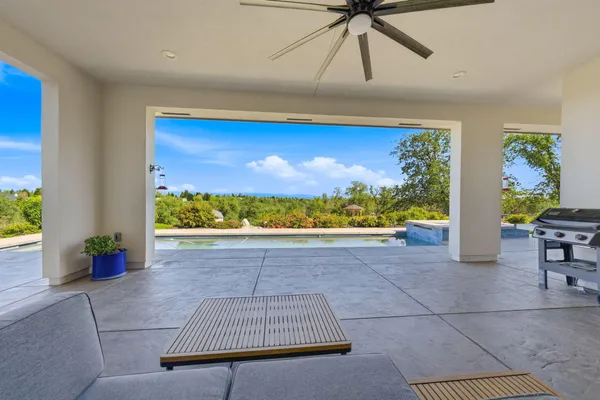 a view of a house with a swimming pool