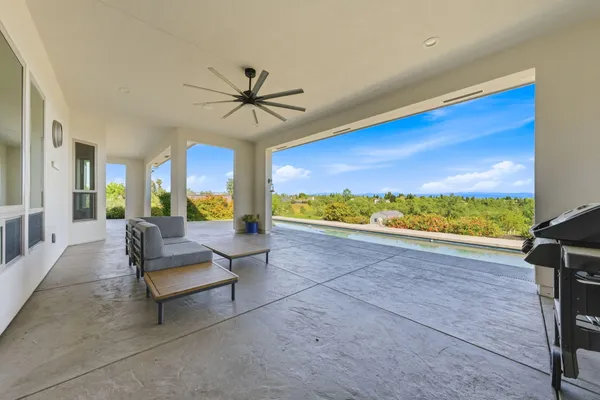 a view of a house with a swimming pool