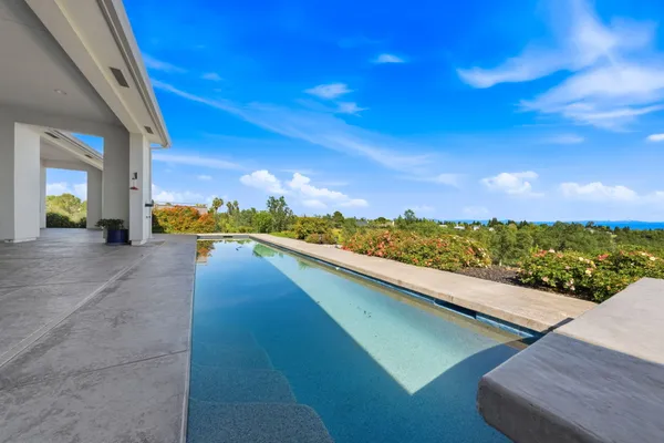 a view of a backyard with garden