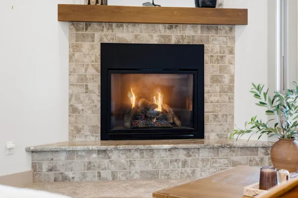 a fireplace with an outdoor space