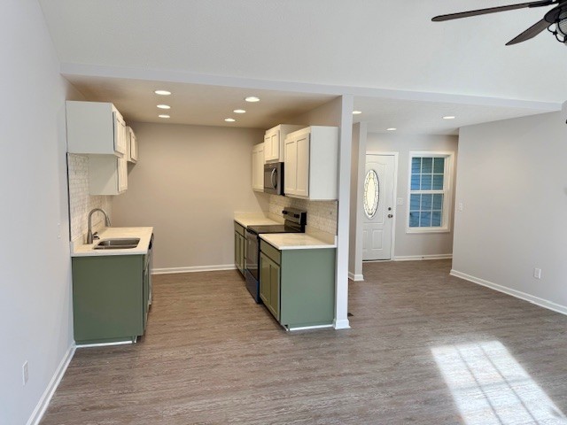 4214 Riley Creek Road Normandy, TN 37360 - Photo 11 of 46 a kitchen with kitchen island a sink stainless steel appliances and cabinets