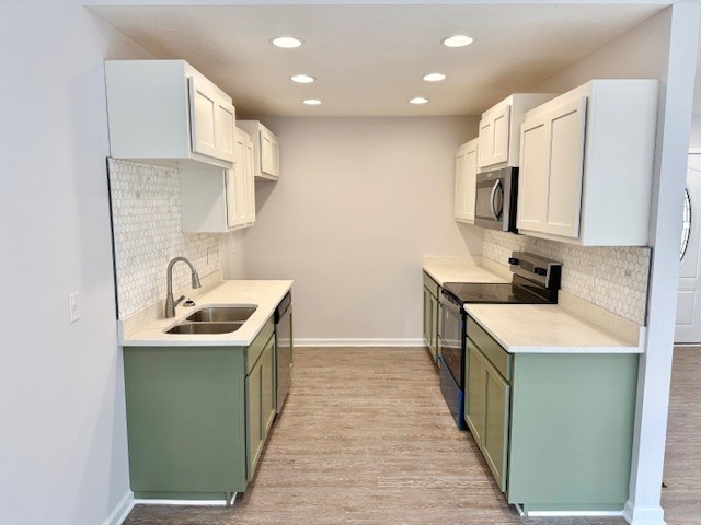 4214 Riley Creek Road Normandy, TN 37360 - Photo 13 of 46 a kitchen that has a sink and a stove in it