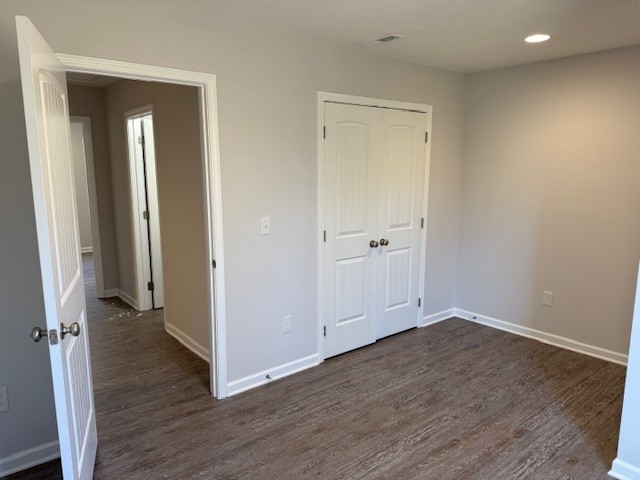 4214 Riley Creek Road Normandy, TN 37360 - Photo 38 of 46 an empty room with wooden floor & closet area