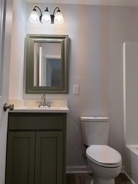 4214 Riley Creek Road Normandy, TN 37360 - Photo 43 of 46 a bathroom with a toilet sink and mirror