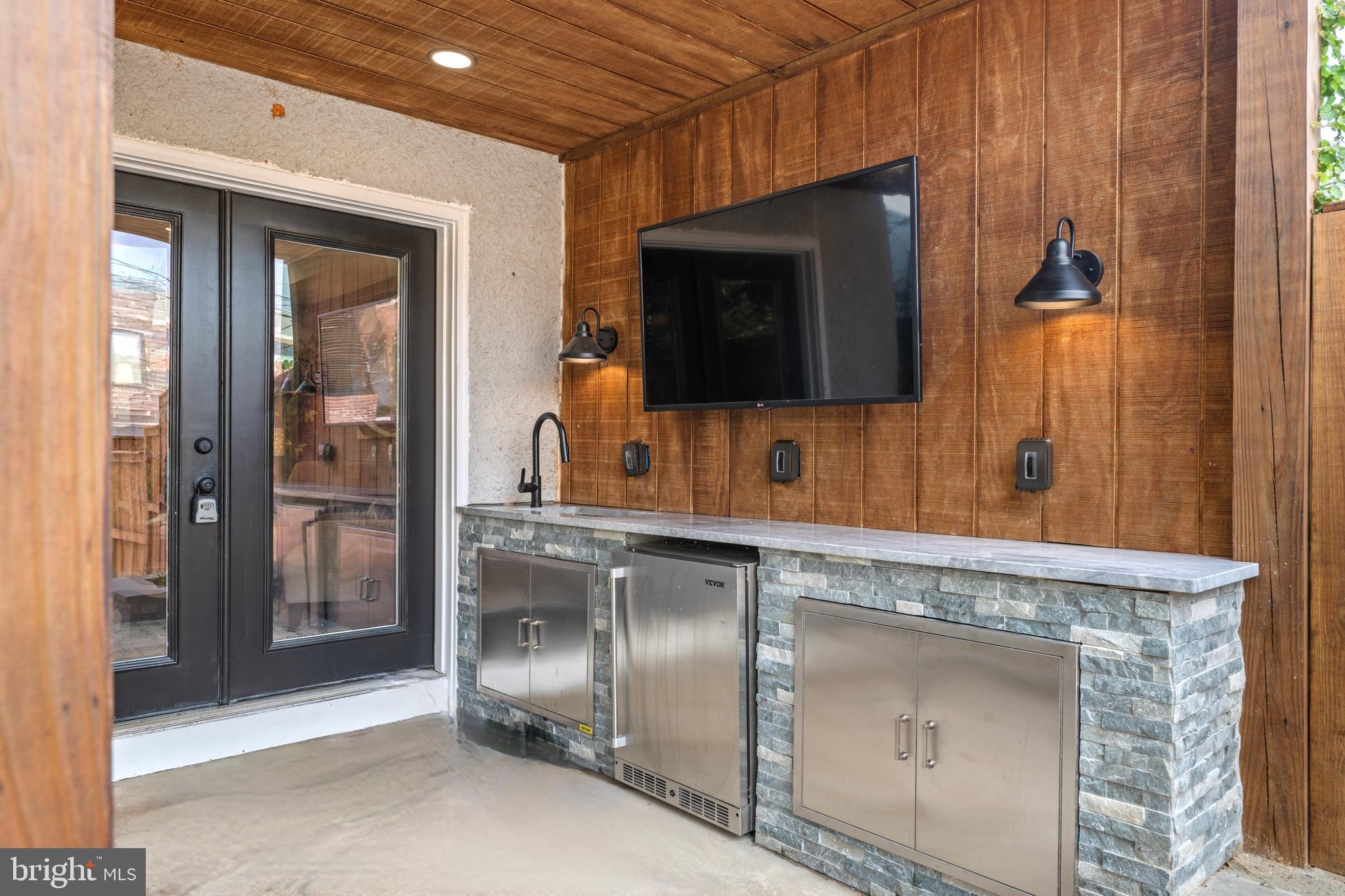 422 11th Street Southeast Washington, DC 20003 - Photo 20 of 51 a bathroom with a sink and a mirror