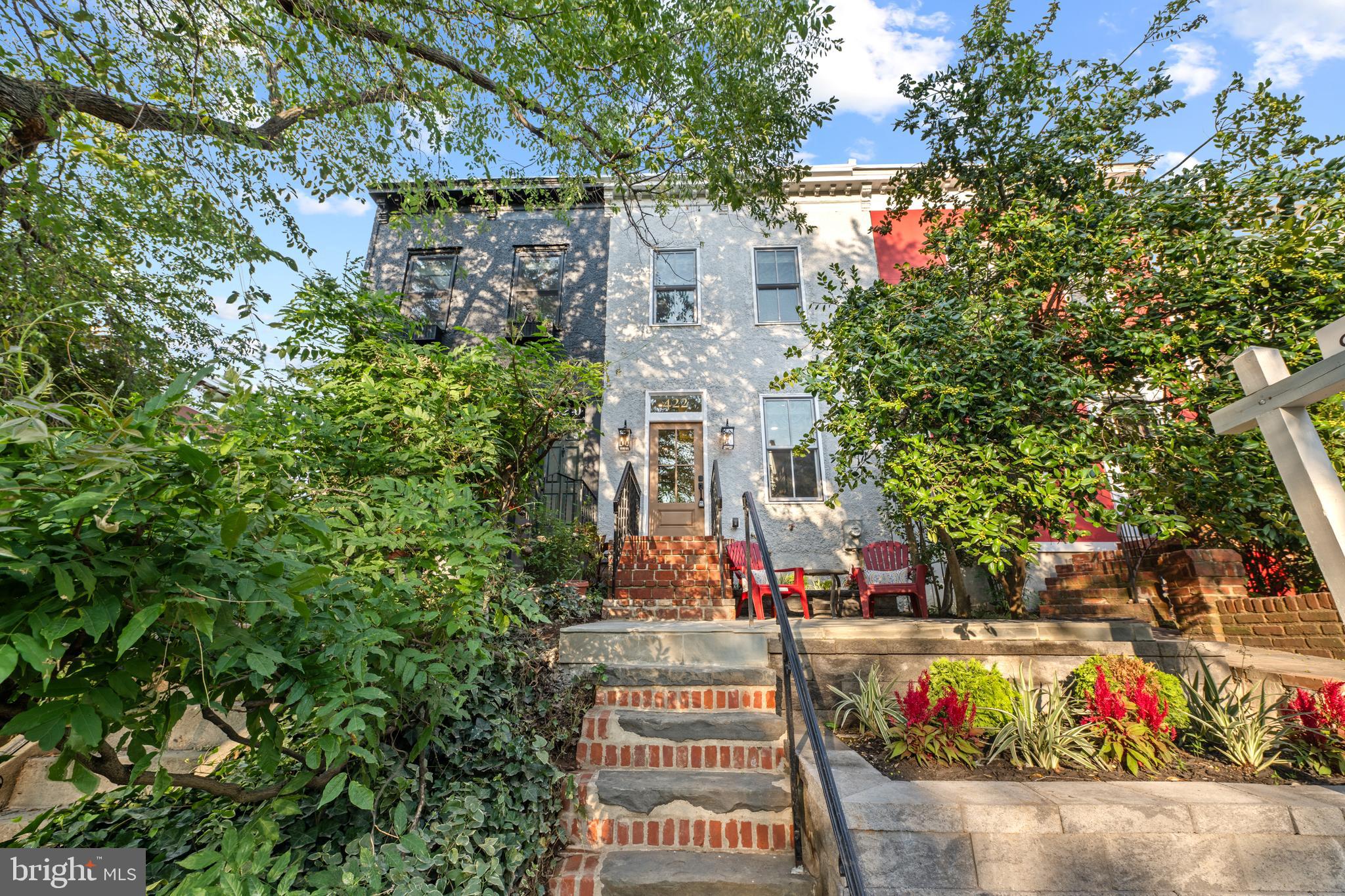 422 11th Street Southeast Washington, DC 20003 - Photo 2 of 51 a view of street with flower on side of it