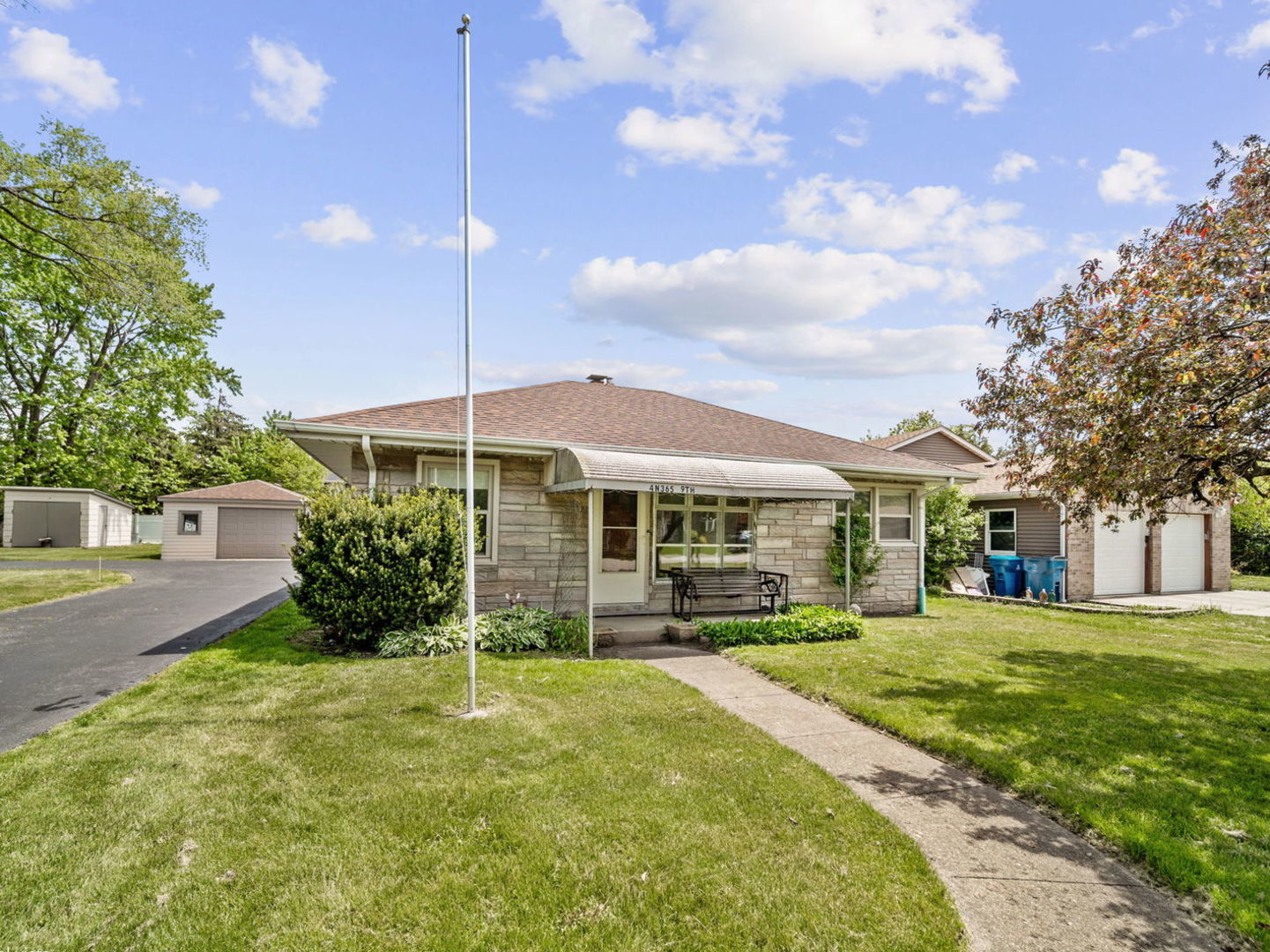 4N365 9th Avenue Addison, IL 60101 - Photo 20 of 24 a view of a house with a yard and potted plants
