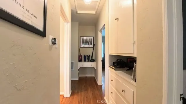 a view of a bathroom from a hallway