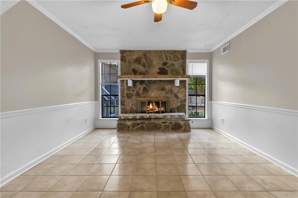 393 Cedar Trace Southwest Marietta, GA 30008 - Photo 23 of 33 a view of empty room with wooden floor and fan