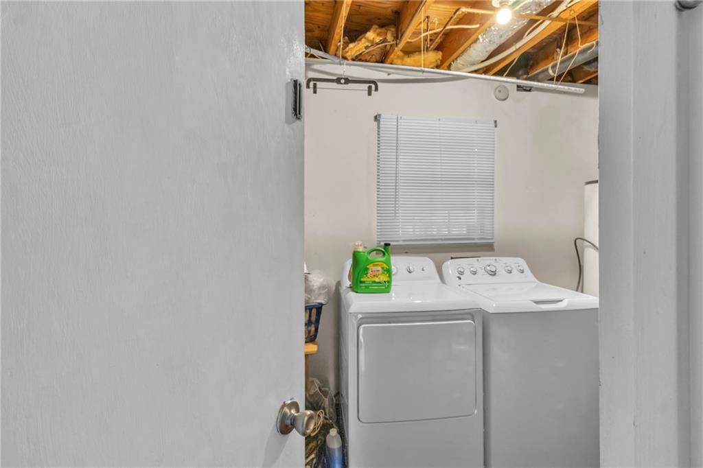 393 Cedar Trace Southwest Marietta, GA 30008 - Photo 25 of 33 a utility room with dryer and washer