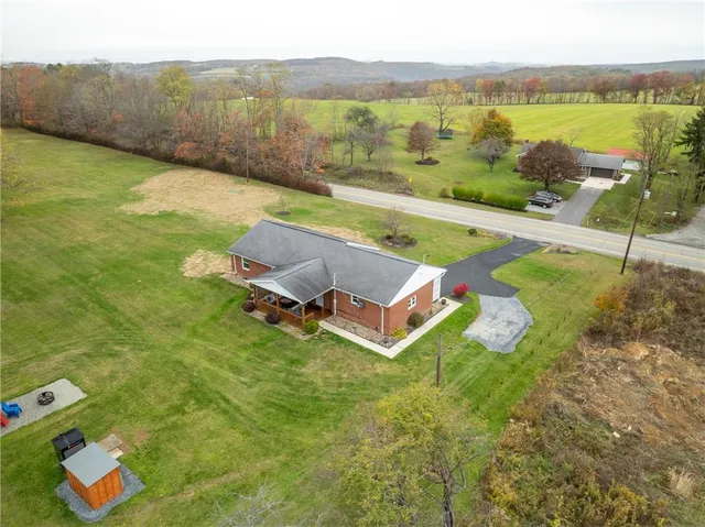 a view of a lake with a yard