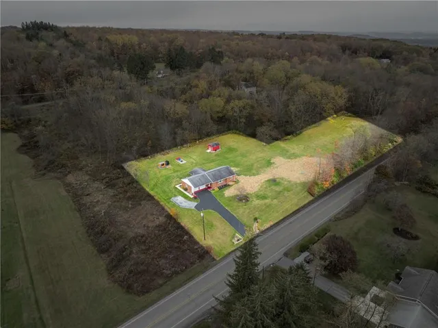a view of a yard with an outdoor space