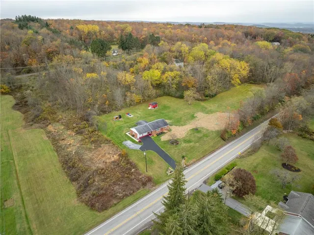 a view of a yard with an outdoor space